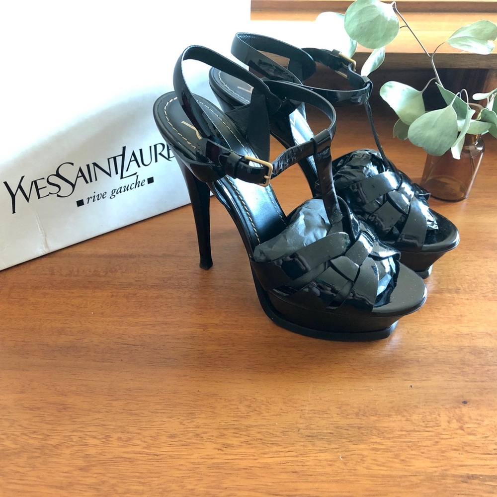 SAINT LAURENT
Tribute 105 patent-leather sandals
